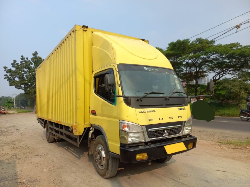 Pengemasan Barang Profesional dan Truk Colt Diesel: Kombinasi Sempurna untuk Pengiriman Maksimal